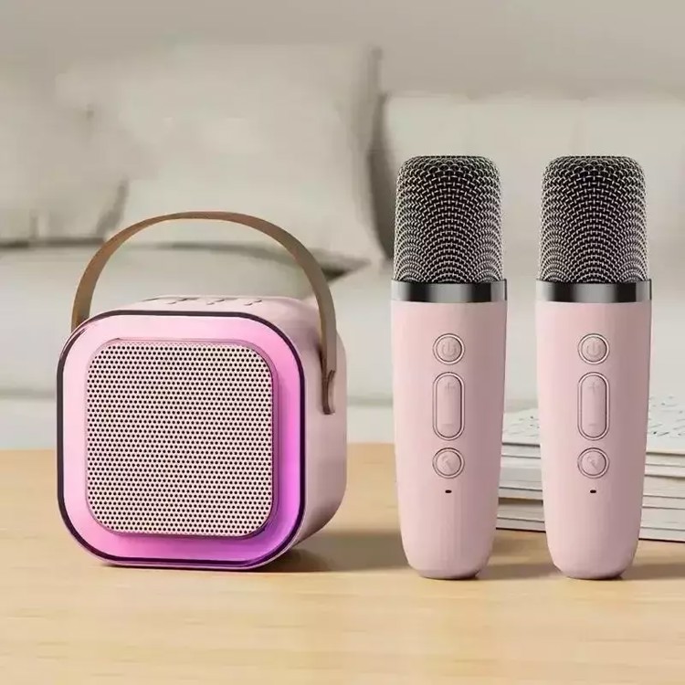 Mini karaokê K12 com 2 Microfones - Recarregável - Cor Rosa